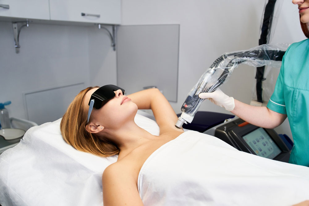 patient receiving laser hair removal treatment